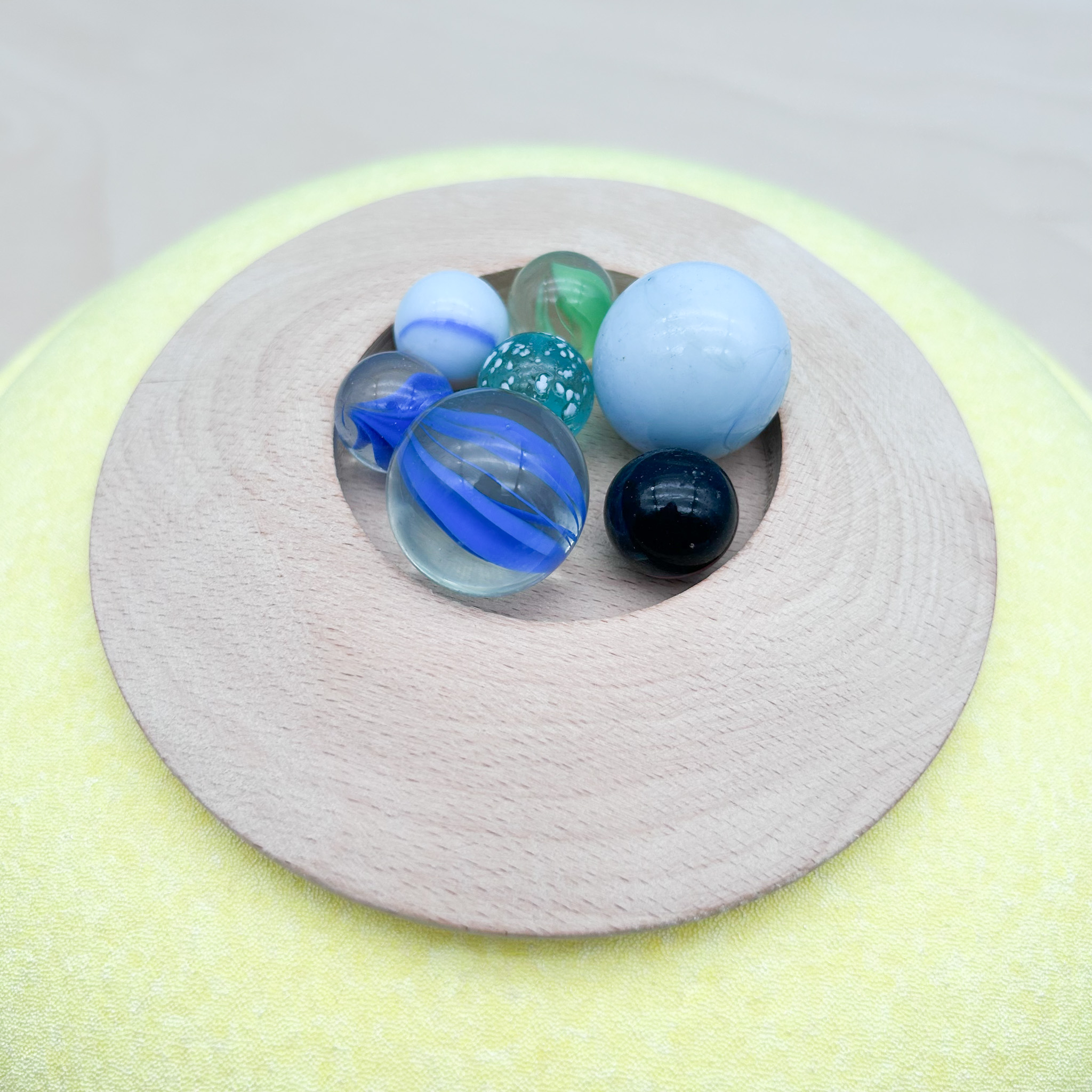 Murmeltellerspiel mit 31 Murmeln